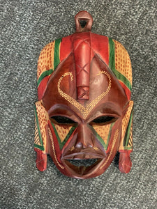 African Imports - Custom Hand Carved Wooden Mask  Detail Coloring Earth Tones, Red, Brown and Mahogany Wood SKU: HANAH11